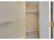 Walk-in closet with neutral walls, carpeted floor and ample shelving and storage at 5553 High Wager Way # 101, Las Vegas, NV 89122