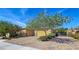 Charming single-story home features a two-car garage, beautiful desert landscaping, and gated entry at 6975 Hopi Summit Ct, Las Vegas, NV 89149