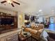 Spacious living room showcasing an open layout connecting to the kitchen and other living spaces at 6975 Hopi Summit Ct, Las Vegas, NV 89149