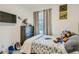 A bedroom featuring charming airplane artwork and comfortable decor at 7360 N Decatur Blvd # 1, Las Vegas, NV 89131