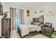 A bedroom featuring a cozy bed, themed decor, and comfortable furnishings at 7360 N Decatur Blvd # 1, Las Vegas, NV 89131