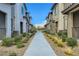 View of the complex showing the walkway and landscaping at 7360 N Decatur Blvd # 1, Las Vegas, NV 89131