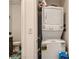 Compact laundry closet featuring stacked washer and dryer units, perfect for efficient space utilization at 7360 N Decatur Blvd # 1, Las Vegas, NV 89131