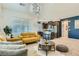 Open-concept living room connects to a stylish kitchen for seamless entertaining at 7360 N Decatur Blvd # 1, Las Vegas, NV 89131