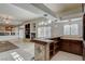 Entertainers dream with wet bar and shelving adjacent to the main living area at 7619 Belgian Lion St, Las Vegas, NV 89139