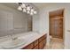 Bathroom with double sink vanity and a walk-in shower at 7619 Belgian Lion St, Las Vegas, NV 89139