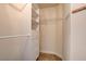 Walk-in closet with built-in shelving and drawers for organization at 7619 Belgian Lion St, Las Vegas, NV 89139