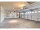 Spacious three car garage with ample room for parking and storage at 7619 Belgian Lion St, Las Vegas, NV 89139