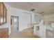 Hallway with carpet and neutral walls leading to other rooms with natural light and storage at 7619 Belgian Lion St, Las Vegas, NV 89139
