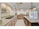 Spacious kitchen featuring granite counters, stainless steel appliances, and plenty of cabinet space at 7619 Belgian Lion St, Las Vegas, NV 89139