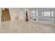 Open living area featuring tile floors and seamless transition between spaces at 7619 Belgian Lion St, Las Vegas, NV 89139