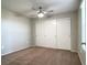 Neutral bedroom with carpet flooring, ceiling fan, and sliding door closet at 8101 W Flamingo Rd # 1088, Las Vegas, NV 89147