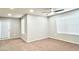 Bright bedroom with neutral walls, carpet flooring, two large windows and ceiling fan at 8101 W Flamingo Rd # 1088, Las Vegas, NV 89147