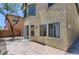 Private backyard featuring a stamped concrete patio and view of the home's rear exterior at 8143 Retriever Ave, Las Vegas, NV 89147