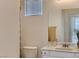 Bathroom featuring single sink vanity, and a window for natural light at 8143 Retriever Ave, Las Vegas, NV 89147