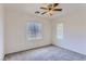 Bedroom with multiple windows, carpet flooring and a ceiling fan at 8143 Retriever Ave, Las Vegas, NV 89147