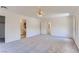 Spacious main bedroom featuring plush carpet, ceiling fan, ensuite bathroom, and plenty of natural light at 8143 Retriever Ave, Las Vegas, NV 89147