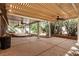 Large covered patio featuring ceiling fans for outdoor comfort and shaded relaxation at 9048 Faversham Ct, Las Vegas, NV 89123