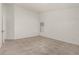 Spacious bedroom showcasing neutral paint, wood-look flooring, and a window for natural light at 9048 Faversham Ct, Las Vegas, NV 89123