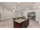 Kitchen featuring breakfast bar, stainless steel appliances, and an open layout at 9048 Faversham Ct, Las Vegas, NV 89123