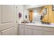 Bright bathroom featuring a spacious vanity with white cabinets and ample counter space at 9330 Soothing Sea St # Lot 92, Las Vegas, NV 89178