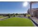 Backyard with artificial turf, desert landscaping, and stunning views from the patio and backyard at , Las Vegas, NV 89134