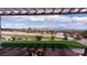 Serene backyard with artificial turf, offering panoramic views of the golf course and snow-capped mountains at , Las Vegas, NV 89134
