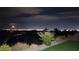 Beautiful backyard showcasing stunning night views of the city lights and dark, starry skies at , Las Vegas, NV 89134