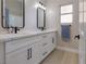 Modern bathroom with double vanity, sleek fixtures, and white cabinets, providing a spa-like experience at , Las Vegas, NV 89134