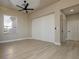 Spacious bedroom featuring neutral paint, wood floors, and a large window for natural light at , Las Vegas, NV 89134