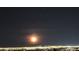 Captivating night view showcasing the city lights under a dark, starry sky with the moon at , Las Vegas, NV 89134