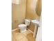 A half bathroom features a modern pedestal sink, tile floors, and neutral-colored walls at 10349 Mystic Pine Rd, Las Vegas, NV 89135