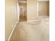 A carpeted bedroom with neutral-toned walls offers a simple and versatile living space at 10349 Mystic Pine Rd, Las Vegas, NV 89135