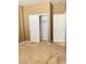 A bedroom with a spacious closet and a neutral color scheme offers both functionality and style at 10349 Mystic Pine Rd, Las Vegas, NV 89135