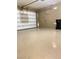 Clean garage with painted walls and epoxy floors at 10349 Mystic Pine Rd, Las Vegas, NV 89135