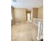 Spacious hallway featuring neutral walls, carpet flooring and white trim that offers a clean and inviting space at 10349 Mystic Pine Rd, Las Vegas, NV 89135