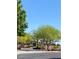 Community playground with modern equipment and shaded seating area at 10349 Mystic Pine Rd, Las Vegas, NV 89135
