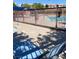 View of the community pool deck with lounge chairs at 10349 Mystic Pine Rd, Las Vegas, NV 89135
