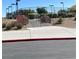 Community tennis courts with stairway access and landscaped entrance at 10349 Mystic Pine Rd, Las Vegas, NV 89135