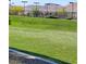 Community tennis courts and green space with mountain views at 10349 Mystic Pine Rd, Las Vegas, NV 89135