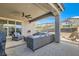 Comfortable outdoor patio area with modern furniture at 10456 Skye Arroyo Ave, Las Vegas, NV 89166