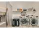Efficient laundry room with stainless steel washer and dryer at 10456 Skye Arroyo Ave, Las Vegas, NV 89166