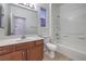 Bathroom featuring a combination tub and shower and single sink at 11178 Corsica Mist Ave, Las Vegas, NV 89135