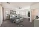 Bright, virtually staged primary bedroom with neutral tones, shuttered windows, a ceiling fan, and an adjacent walk-in closet at 11178 Corsica Mist Ave, Las Vegas, NV 89135