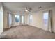 Spacious bedroom with large windows and neutral carpet and paint at 11178 Corsica Mist Ave, Las Vegas, NV 89135