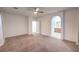 Bedroom with arched access to the ensuite bathroom and walk-in closet at 11178 Corsica Mist Ave, Las Vegas, NV 89135