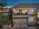 A gorgeous two-story home featuring a balcony above the garage and manicured landscape at 11178 Corsica Mist Ave, Las Vegas, NV 89135