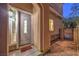 A charming front entrance featuring an elegant door and manicured landscape at 11178 Corsica Mist Ave, Las Vegas, NV 89135