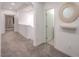 Upstairs hallway featuring neutral colors and access to other rooms at 11178 Corsica Mist Ave, Las Vegas, NV 89135