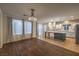 Open concept kitchen with stainless steel appliances and a large island with pendant lighting at 11178 Corsica Mist Ave, Las Vegas, NV 89135